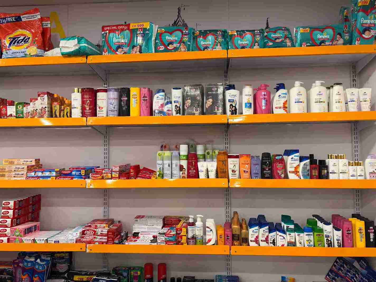 SuperKirana supermarket shelves displaying personal care and FMCG products in organized categories